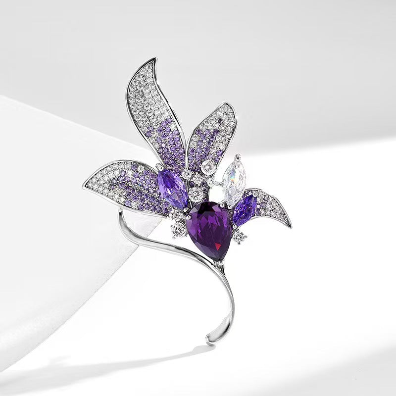 Close-up of the sparkling crystals on the floral brooch