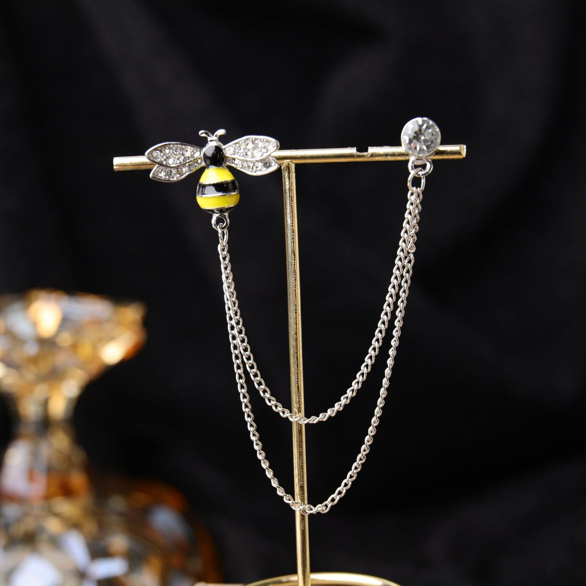 Necklace and brooch set on elegant display