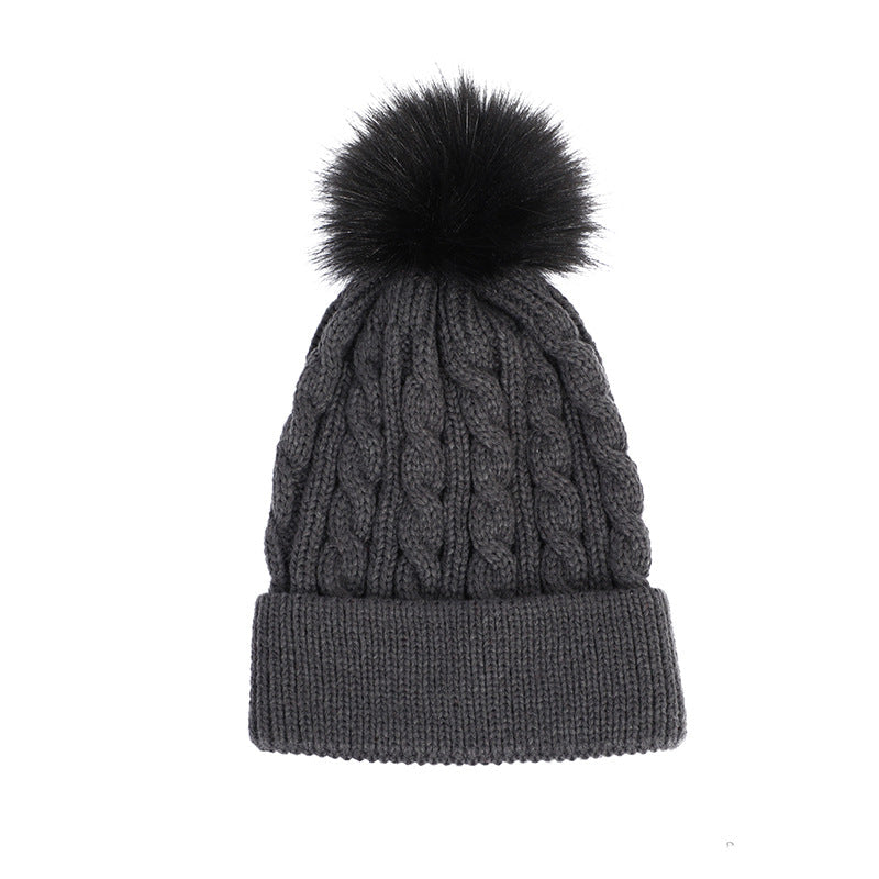 Cozy knit beanie hat in beige with pom pom