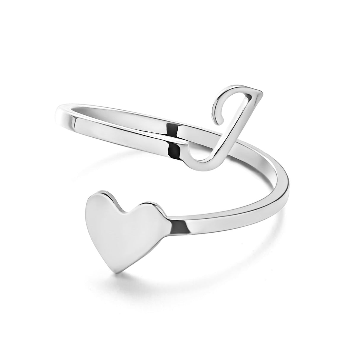 Woman's hand wearing a stylish heart design ring