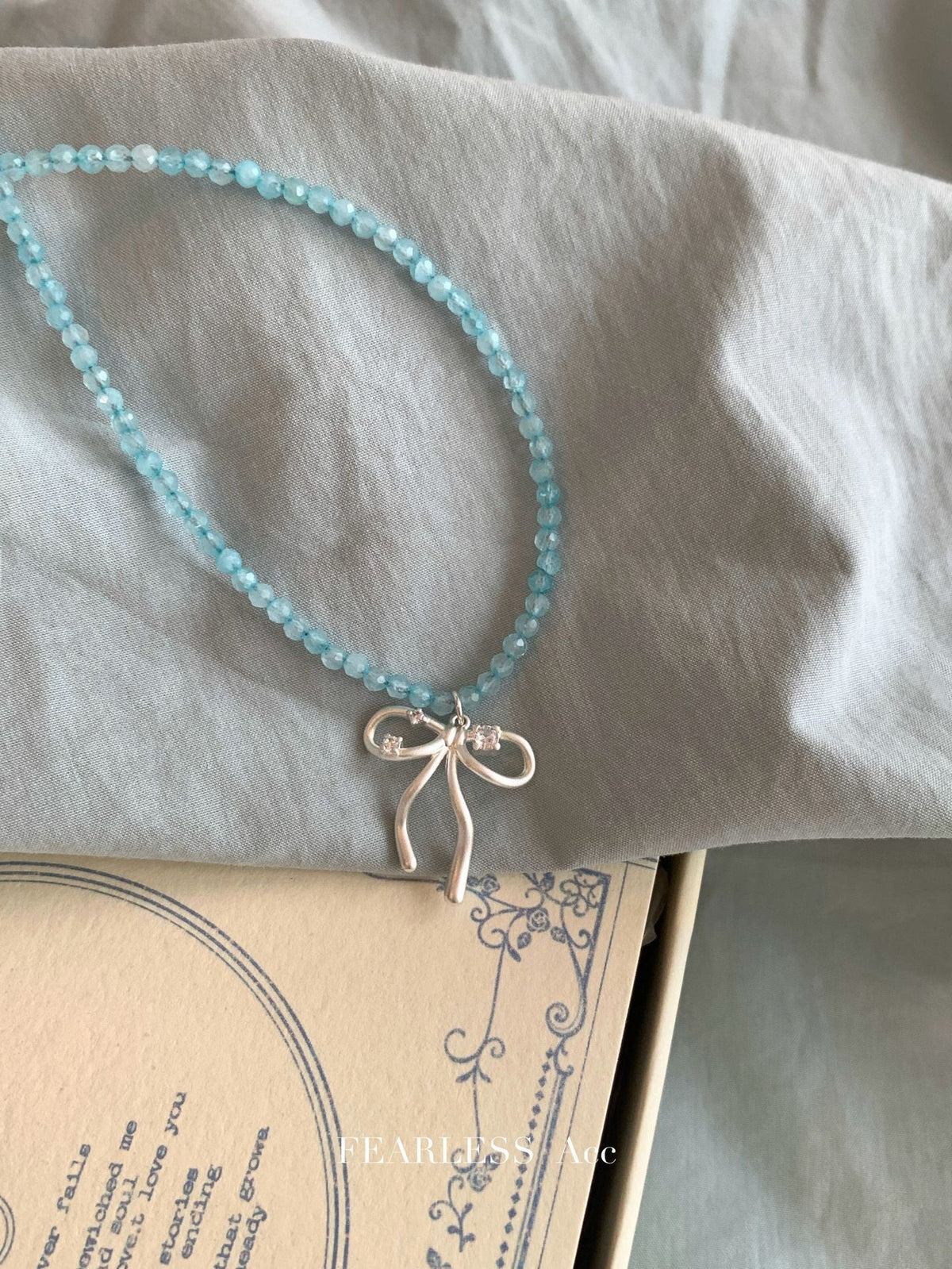 Cute bowknot necklace showcased on display