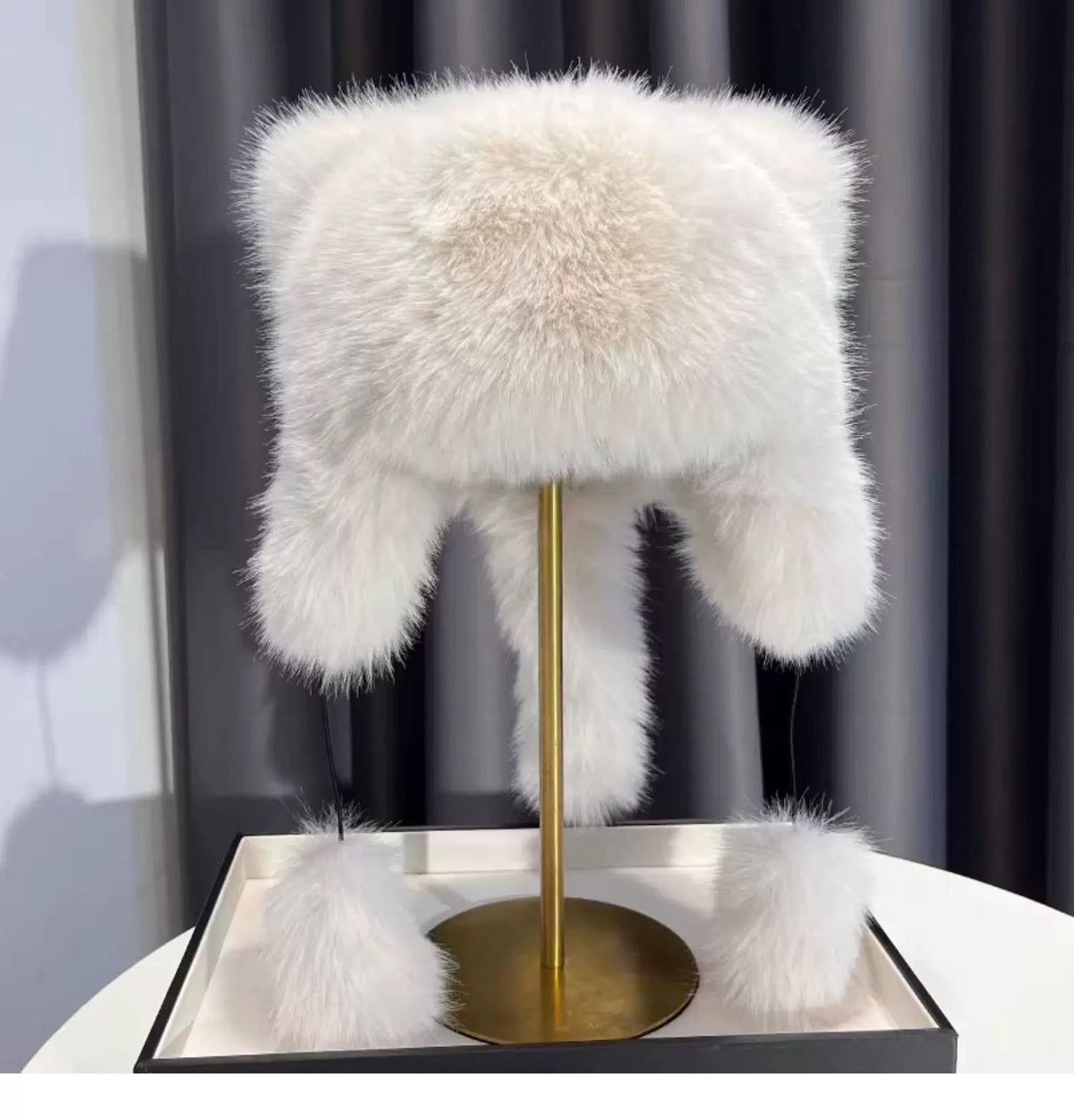 Cute plush winter hat with bear ears hanging display