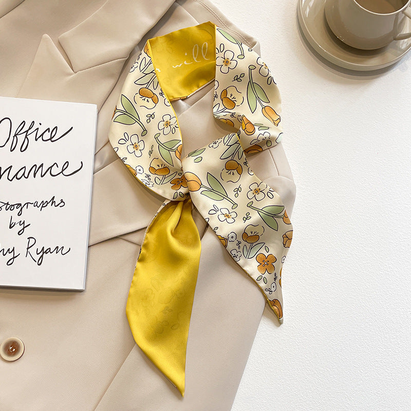 yellow scarf displaying floral designs